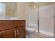Bathroom featuring a modern vanity and a shower with glass doors at 11607 Meetinghouse Dr, Cornelius, NC 28031