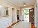 Inviting foyer boasting hardwood floors, traditional moldings, and an open view into other rooms at 11607 Meetinghouse Dr, Cornelius, NC 28031