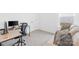 Functional office space featuring a desk setup and a comfortable couch for relaxing at 130 Slalom St, Statesville, NC 28677