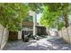 A backyard featuring modern lounge furniture and privacy fence at 1620 S Tryon St, Charlotte, NC 28203
