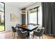 Elegant dining room with modern lighting, stylish seating, and a spacious table for gatherings at 1620 S Tryon St, Charlotte, NC 28203