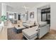 Bright living room with modern décor, hardwood floors, and a seamless transition to the kitchen at 1620 S Tryon St, Charlotte, NC 28203