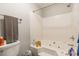 Bathroom featuring a sleek bathtub and shower combination with white tile walls at 1804 Fairlawn Ct, Rock Hill, SC 29732