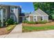 Charming townhome with stone accents, landscaped front yard, and inviting entrance at 1804 Fairlawn Ct, Rock Hill, SC 29732