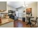 Cozy kitchen featuring granite countertops, stainless steel appliances, and an adjacent dining area at 1804 Fairlawn Ct, Rock Hill, SC 29732