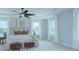 This well-lit main bedroom features many windows and a ceiling fan above the bed at 2000 Plainfield Dr, Bessemer City, NC 28016