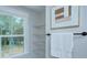 Spacious walk-in closet with ample shelving and a window offering natural light at 2000 Plainfield Dr, Bessemer City, NC 28016
