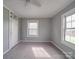 Bedroom featuring a closet, window with blinds and carpet at 201 Robinson Rd, Gastonia, NC 28056