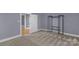 Bedroom features an open closet, carpet, and an open door at 222 W Mccubbins St, Salisbury, NC 28144