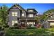 Charming two-story home with landscaped front yard, covered porch, and craftsman-style details at 2221 Kenmore Ave, Charlotte, NC 28204