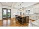 Gourmet kitchen with a large center island, custom cabinets, and stainless steel appliances at 2221 Kenmore Ave, Charlotte, NC 28204