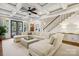 Bright and spacious living room with coffered ceilings, fireplace, and access to the outdoor patio at 2221 Kenmore Ave, Charlotte, NC 28204