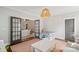 Light filled playroom with plush carpet, French doors, and a cozy play area at 2221 Kenmore Ave, Charlotte, NC 28204