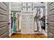 This walk-in closet features custom shelving and storage solutions for optimal organization at 2221 Kenmore Ave, Charlotte, NC 28204