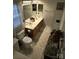 Bathroom with a double sink vanity, tile floors, and neutral decor at 2226 Elendil Ln, Charlotte, NC 28269