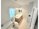 Bright bathroom featuring a double vanity, a toilet and tile floors, natural light and good storage at 2226 Elendil Ln, Charlotte, NC 28269
