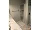 Bathroom showcasing a tiled shower, single sink, and neutral color scheme at 2226 Elendil Ln, Charlotte, NC 28269