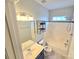 Clean bathroom featuring a shower-tub combo, neutral tones, with a built in shelf and window at 2226 Elendil Ln, Charlotte, NC 28269
