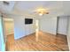 Bedroom featuring hardwood floors, a ceiling fan and recessed lighting, natural light and a walk-in closet at 2226 Elendil Ln, Charlotte, NC 28269