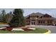 Exterior shot of clubhouse surrounded by manicured landscaping at 2226 Elendil Ln, Charlotte, NC 28269