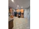 Spacious kitchen with tile floors, wooden cabinets, and black appliances at 2226 Elendil Ln, Charlotte, NC 28269
