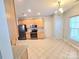 Spacious kitchen with tile floors, stainless steel appliances, and lots of cabinet space at 2226 Elendil Ln, Charlotte, NC 28269