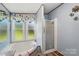 Bathroom featuring a tub under a window and a standing shower at 231 Valley View Dr, Clover, SC 29710