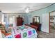 Comfortable bedroom featuring beautiful quilt, wood furniture, and ceiling fan at 231 Valley View Dr, Clover, SC 29710