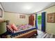 Bedroom with nice bedding, wooden floors, and a view to the outdoors at 231 Valley View Dr, Clover, SC 29710