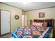 Bedroom with nice bedding, wooden floors, and simple decorations at 231 Valley View Dr, Clover, SC 29710