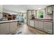 Open concept kitchen with wood flooring, stainless appliances, and a view of the dining area at 231 Valley View Dr, Clover, SC 29710
