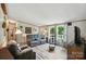 Cozy living room with luxury vinyl plank flooring and ample seating at 231 Valley View Dr, Clover, SC 29710
