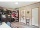 Bright office space with modern desk, lots of storage, and a TV at 231 Valley View Dr, Clover, SC 29710