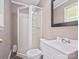Standard bathroom featuring a shower, toilet, sink, and mirror at 2451 Robert H Kirk Rd, Lancaster, SC 29720