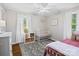 Bright ' bedroom with a crib, a patterned rug, and natural light at 2451 Robert H Kirk Rd, Lancaster, SC 29720