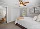 Cozy bedroom with a white bed, a closet, and decor at 2451 Robert H Kirk Rd, Lancaster, SC 29720