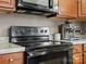 Close up on modern black oven and stainless steel espresso machine at 2451 Robert H Kirk Rd, Lancaster, SC 29720