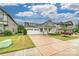 Charming two-story home with a two-car garage, manicured lawn, and mature landscaping at 2760 Berkhamstead Cir, Concord, NC 28027