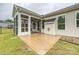 Covered outdoor patio with brick floor and exterior view at 2760 Berkhamstead Cir, Concord, NC 28027