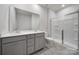 Modern bathroom features double vanity and glass-enclosed shower at 300 Kennerly Center Dr, Mooresville, NC 28115