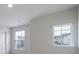 Bedroom featuring neutral paint, carpet, a window, and base molding at 300 Kennerly Center Dr, Mooresville, NC 28115