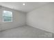 Clean bedroom with neutral walls, carpeted flooring, and natural light at 300 Kennerly Center Dr, Mooresville, NC 28115