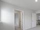 Hallway showcasing open doorways to the bedrooms and baths at 300 Kennerly Center Dr, Mooresville, NC 28115