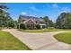 Beautiful 2-story home with an expansive driveway and manicured lawn at 3068 River Rd, Shelby, NC 28152