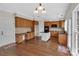 Well-equipped kitchen with custom wood cabinetry, stainless appliances, and a central island at 3068 River Rd, Shelby, NC 28152