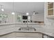 Open concept kitchen featuring granite countertops and sight lines to the living room at 308 Planters Way, Mount Holly, NC 28120