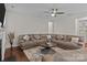 Spacious living room with comfortable seating and a modern ceiling fan at 308 Planters Way, Mount Holly, NC 28120