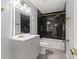 Modern bathroom design with black marble tile and gold accents at 3124 Pikes Peak Dr, Gastonia, NC 28052