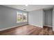 Bedroom features wood laminate flooring, neutral paint, and great natural light at 3124 Pikes Peak Dr, Gastonia, NC 28052
