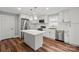 Modern kitchen featuring white cabinetry, stainless steel appliances, and a large island at 3124 Pikes Peak Dr, Gastonia, NC 28052